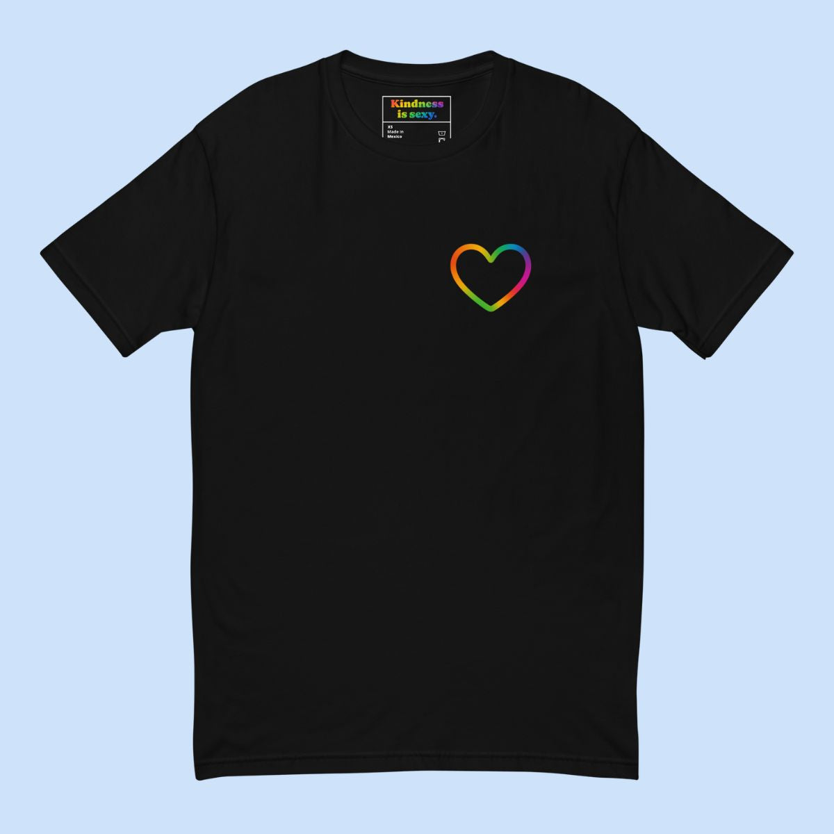Black t-shirt with a rainbow heart design on a light blue background